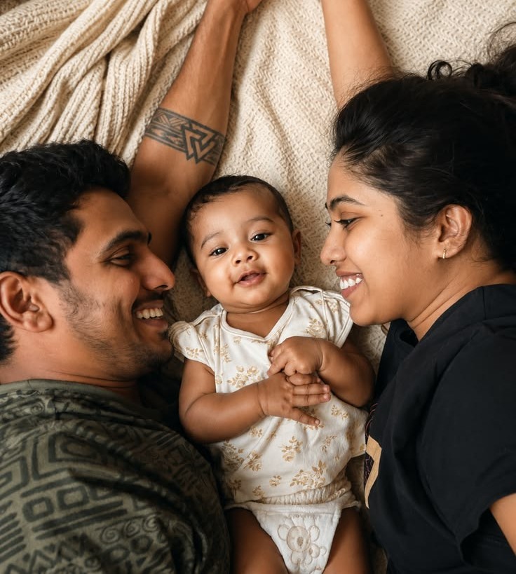 Happy family with newborn baby